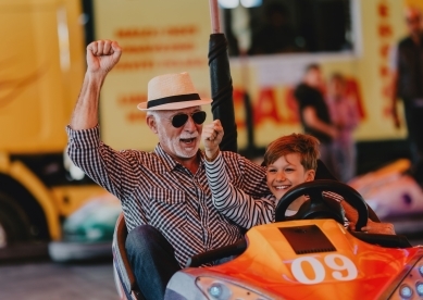 Grandfather with Grandson on Bumper Car